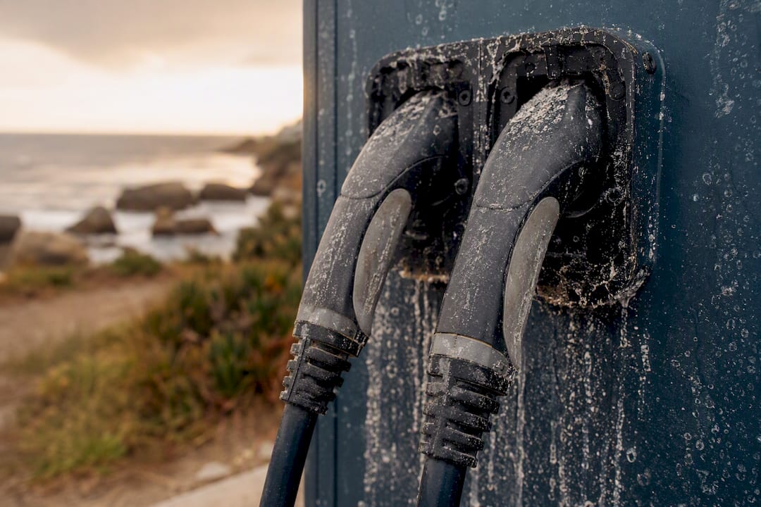Corroded EV charger connectors at coastal site