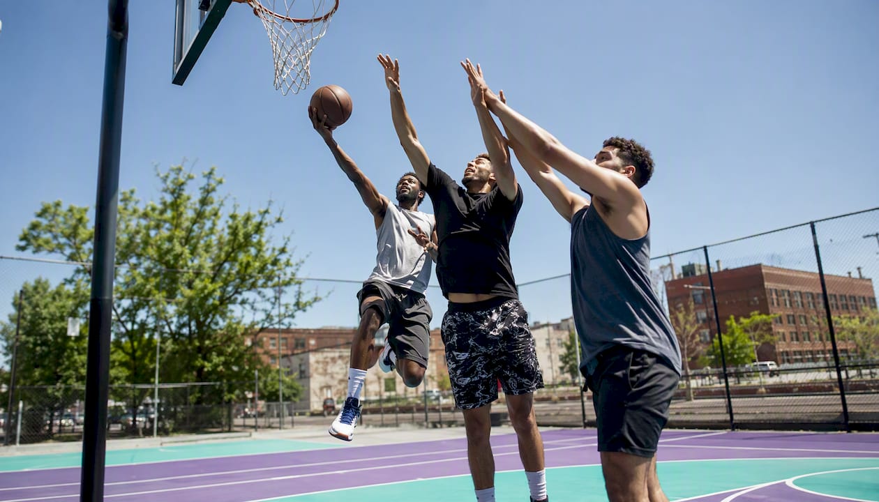 Small group playing basketball King of the Court