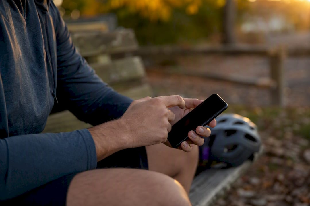Hands texting quick RSVP for pickup game