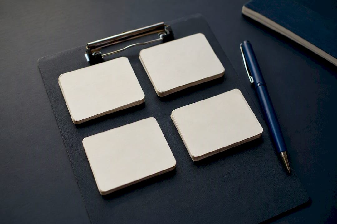 Categorized blank cards on clipboard