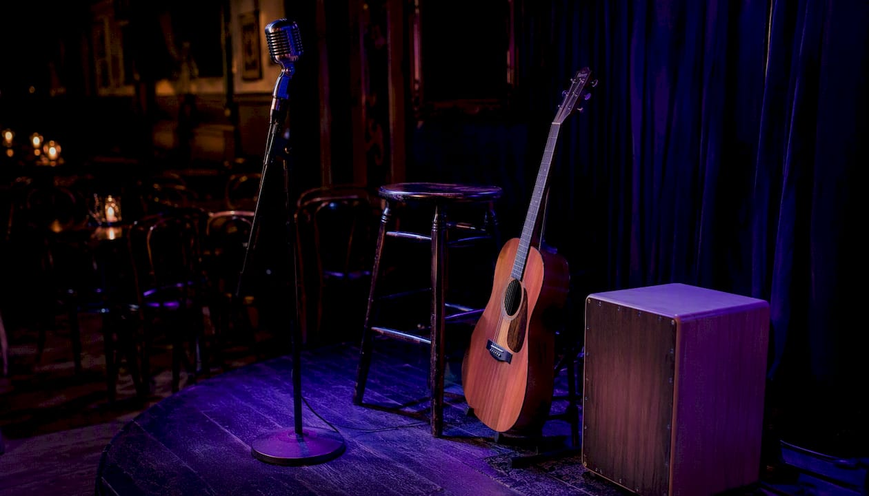 Empty stage with guitar and microphone stand