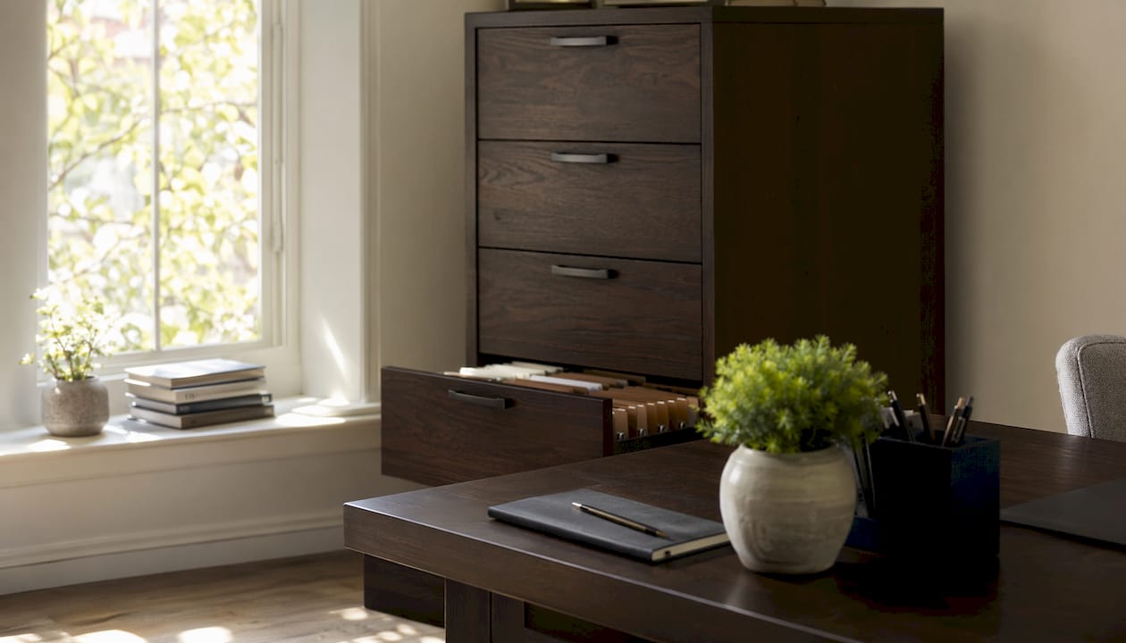 Secure filing cabinet with organized folders open
