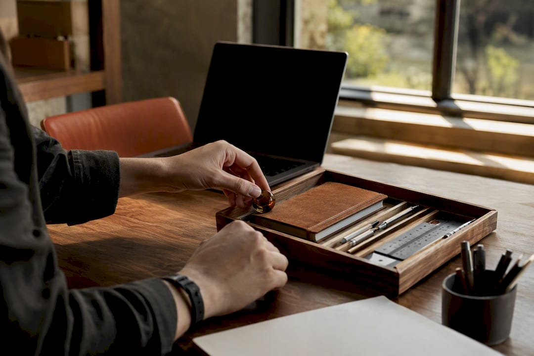Hands placing a decision token in organizer box