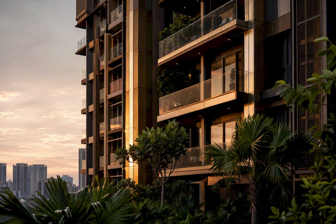 Luxury condo exterior with greenery
