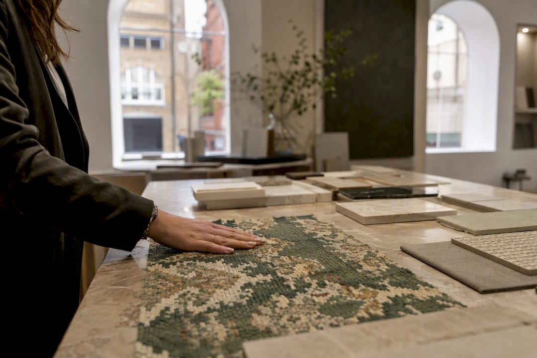 Material samples on table in trade showroom