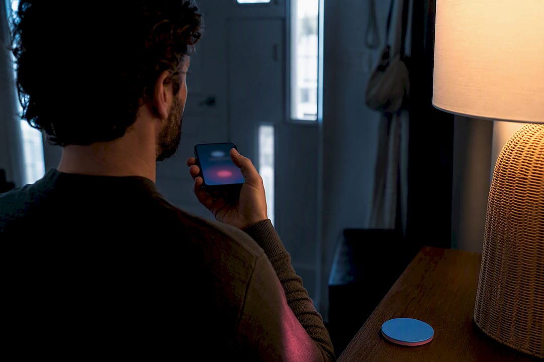 Person practicing a phone call at home