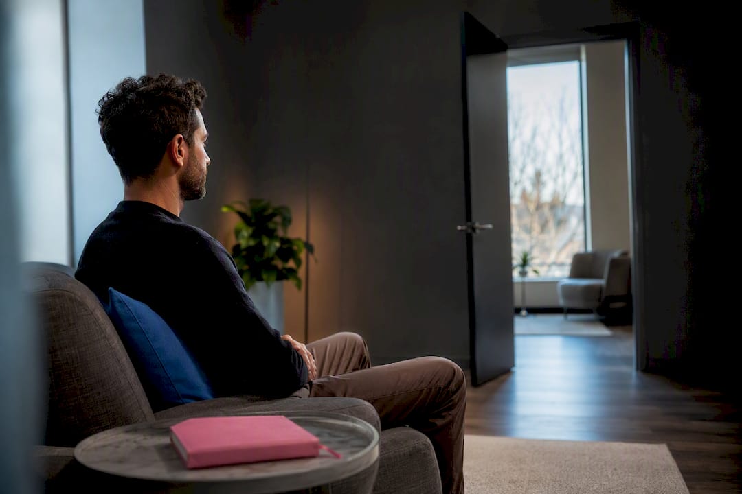 Adult practicing exposure in therapy room