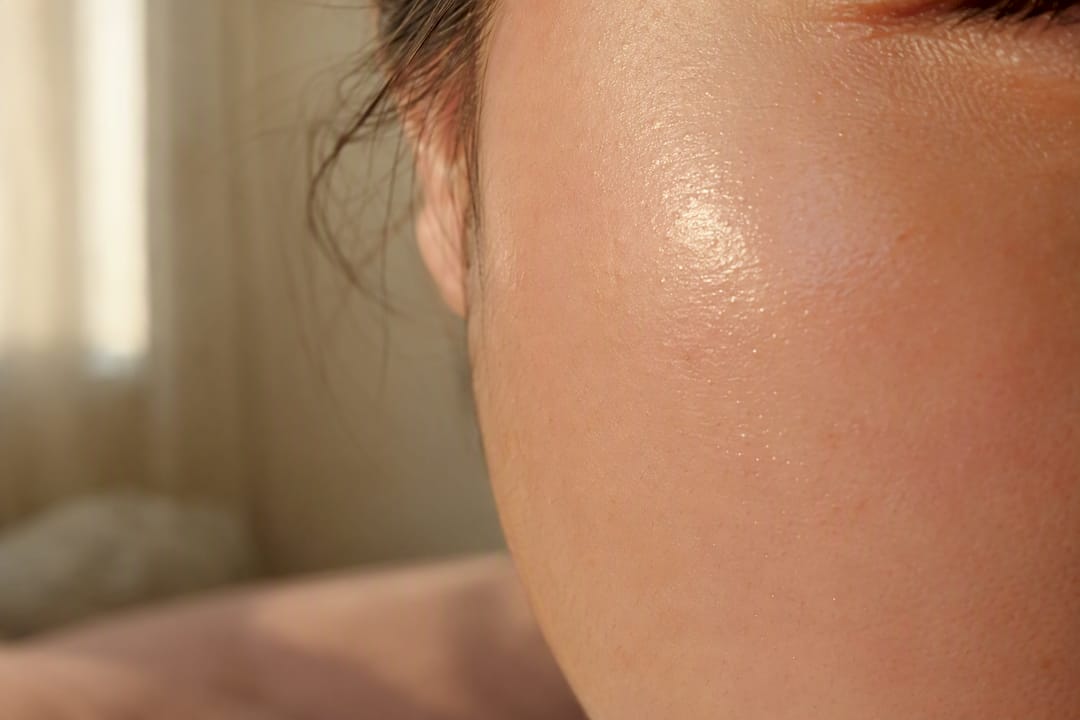 Close-up of hydrated, glowing cheek skin