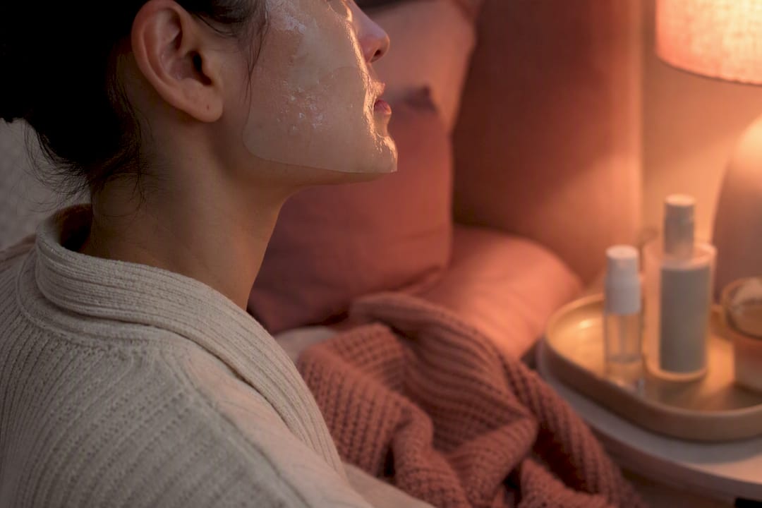 Partially absorbed transparent hydrogel mask on cheek