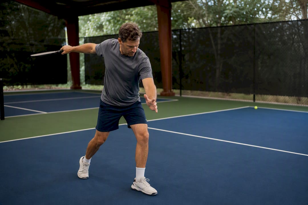 Player practicing a slow pickleball dry swing