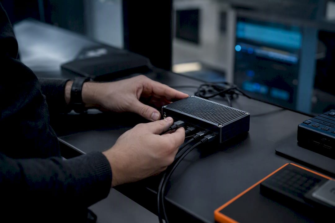 Hands verifying AI forensic data device