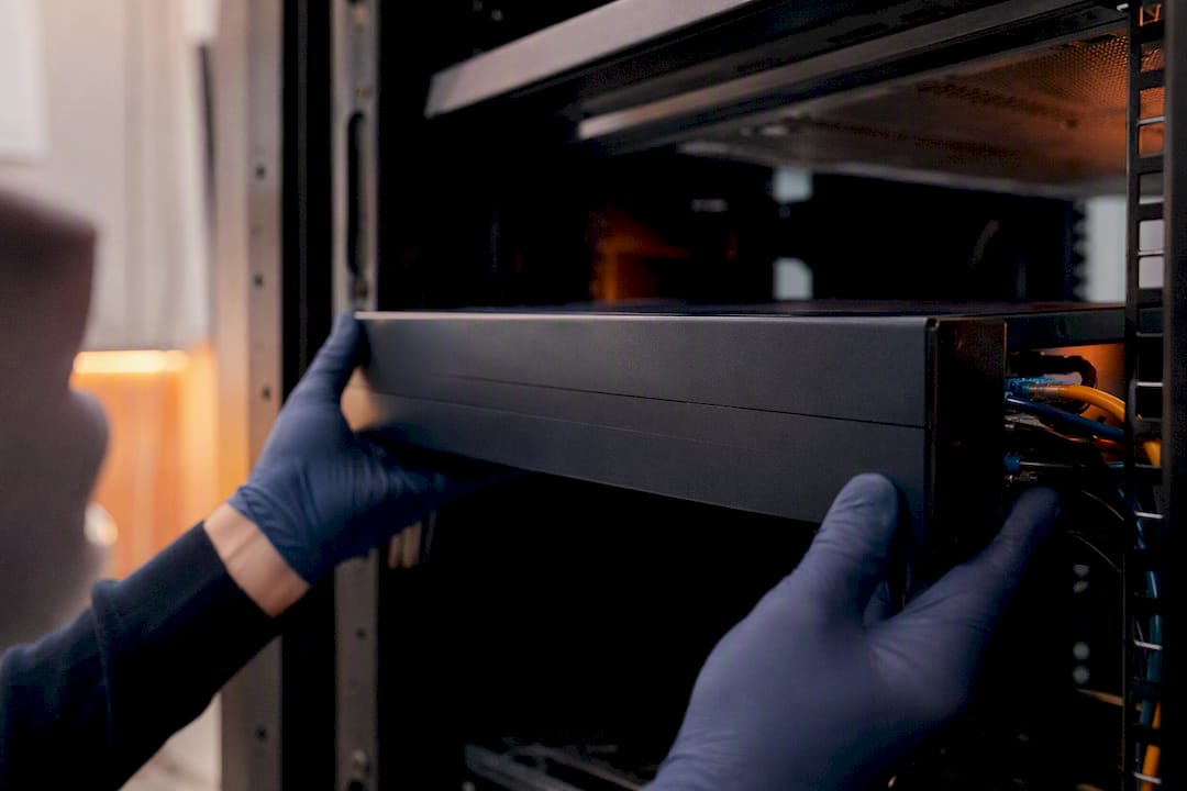 Hands deploying security hardware filter
