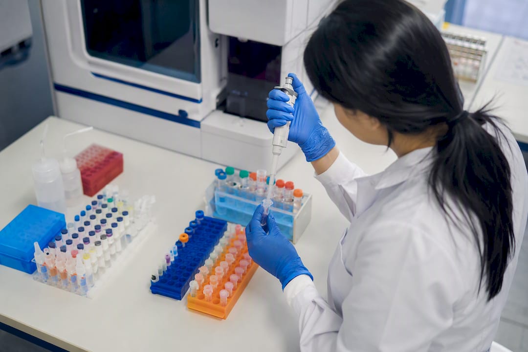 Scientist preparing flow cytometry isotype control sample