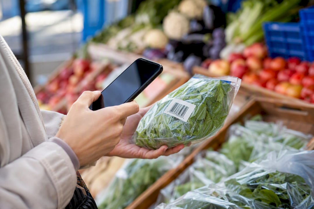 Hand scanning product barcode with phone