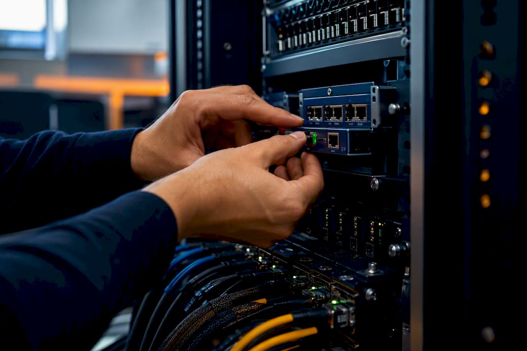 Hands reconnecting hardware for retrieval system