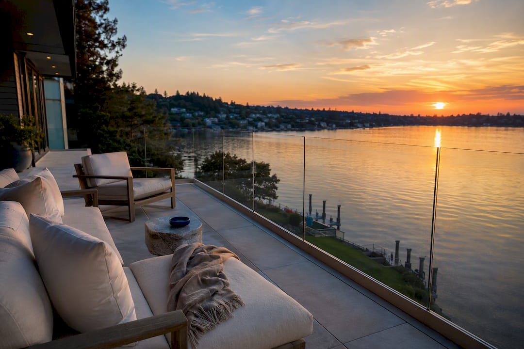 West-facing waterfront terrace at sunset