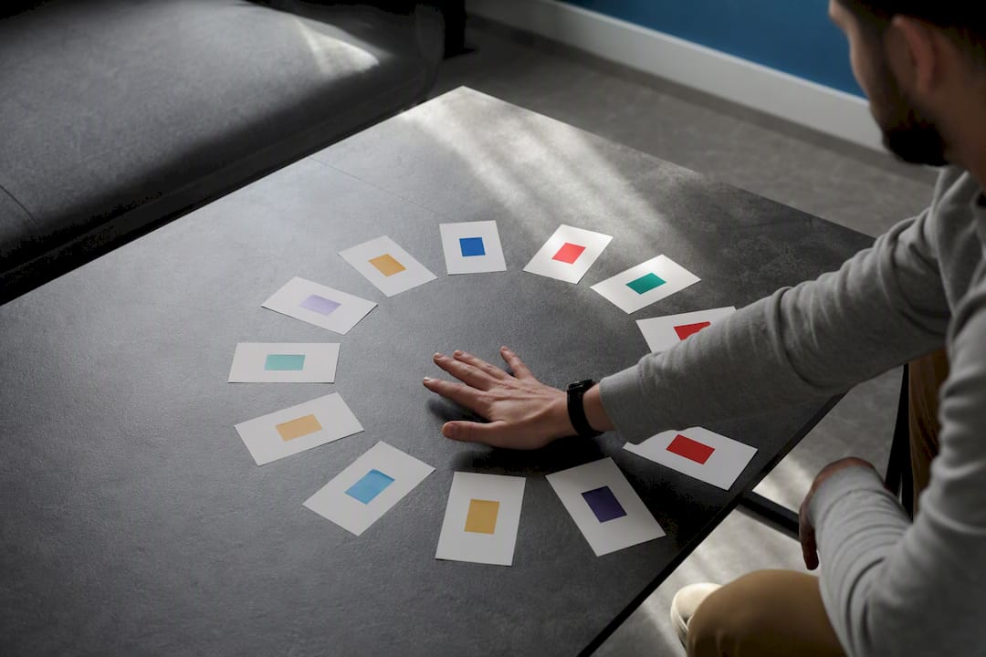 Hand holding colored test cards