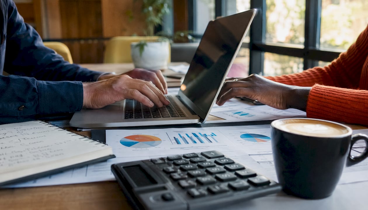 Hands entering AI infrastructure costs
