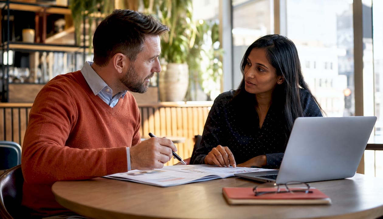 IT professionals reviewing training materials