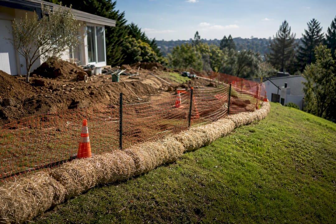 Safety fencing and erosion control on landscaping site