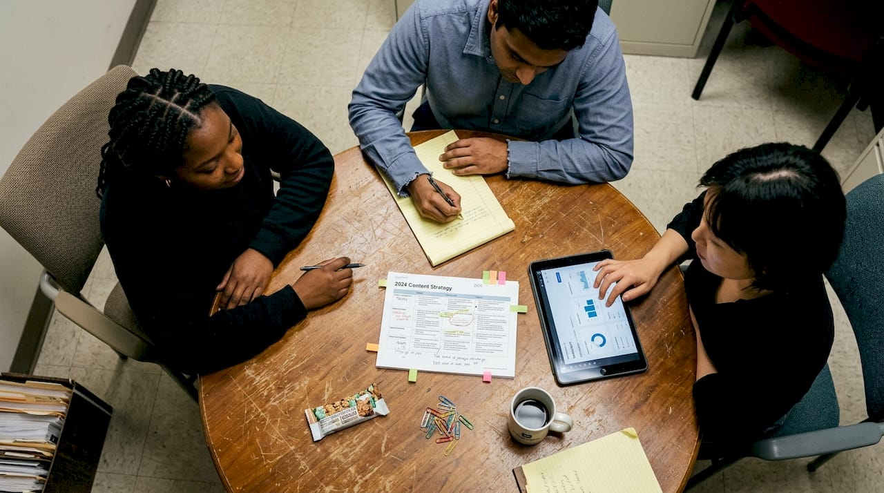 Team discussing small business content strategy