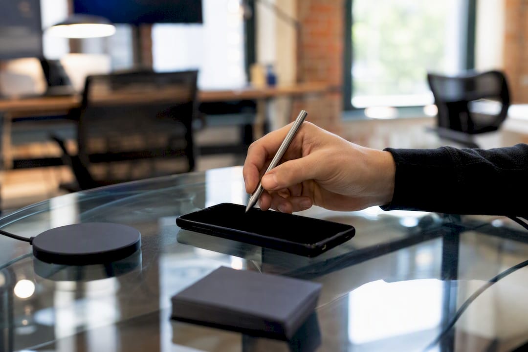Founder interacting with a phone for investor matching