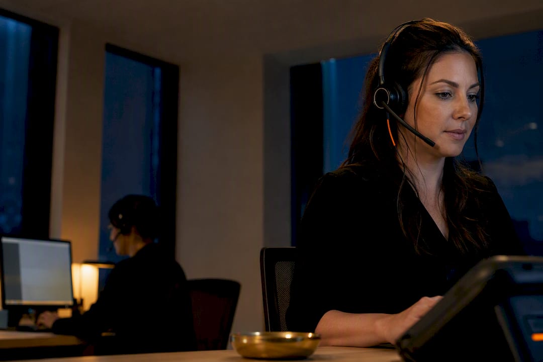 Home care coordinator handling an after-hours triage call