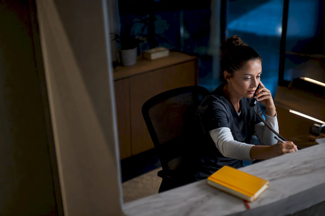 Coordinator handling an after-hours care call