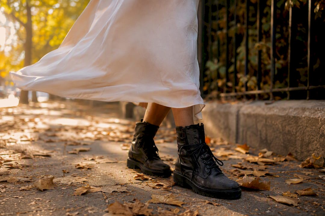 Slip dress contrasted with rugged combat boots