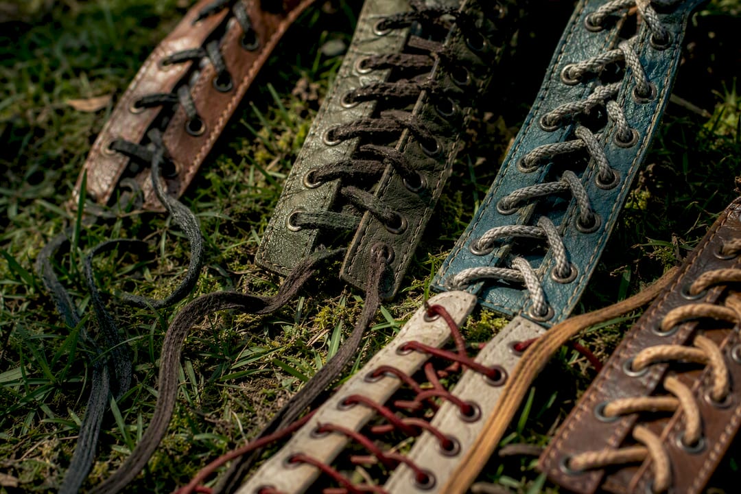 Close-up of six combat boot lacing patterns