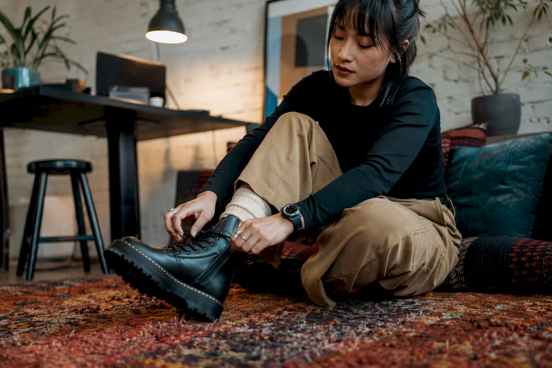 Person trying on boots with thick socks