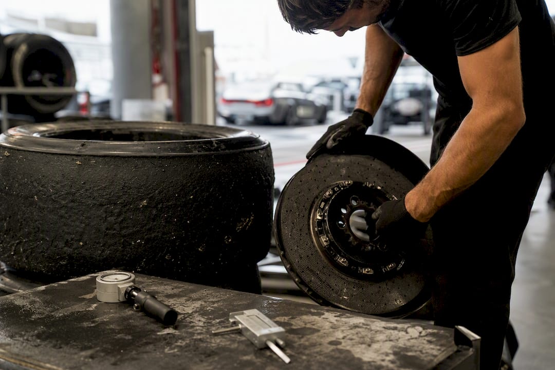 Hand checking brakes and tires after track use