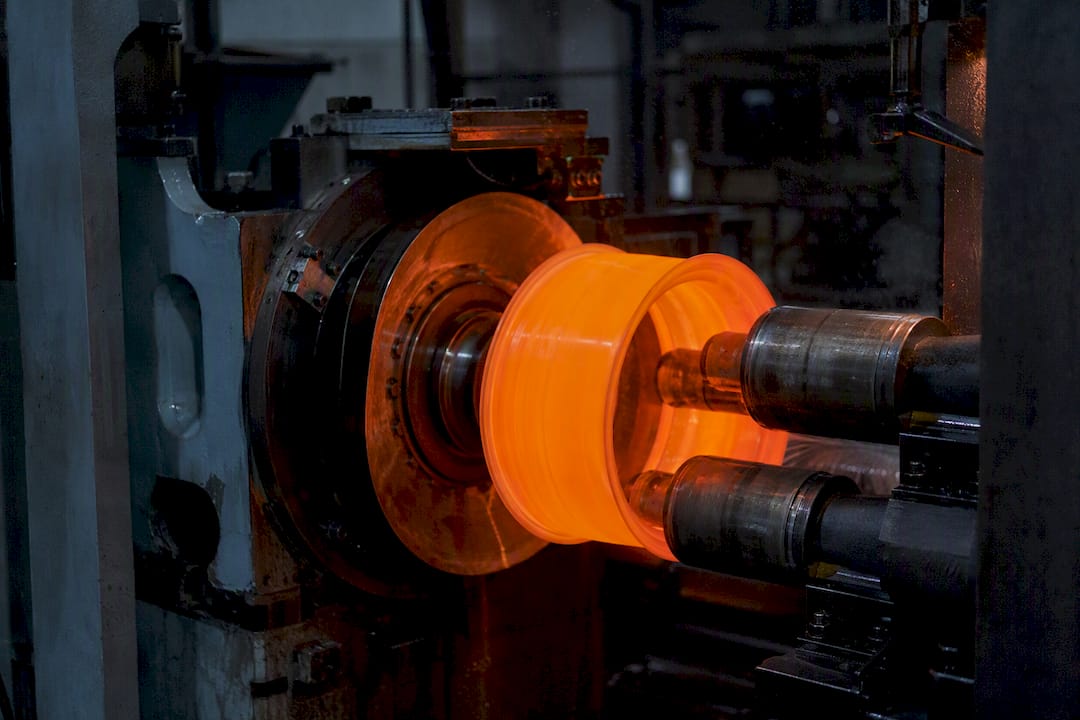 Wheel barrel being compressed during flow forming