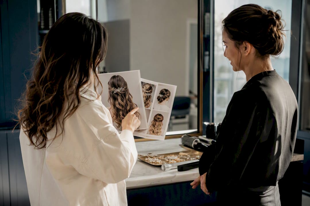 Bride describing hairstyle photos during trial