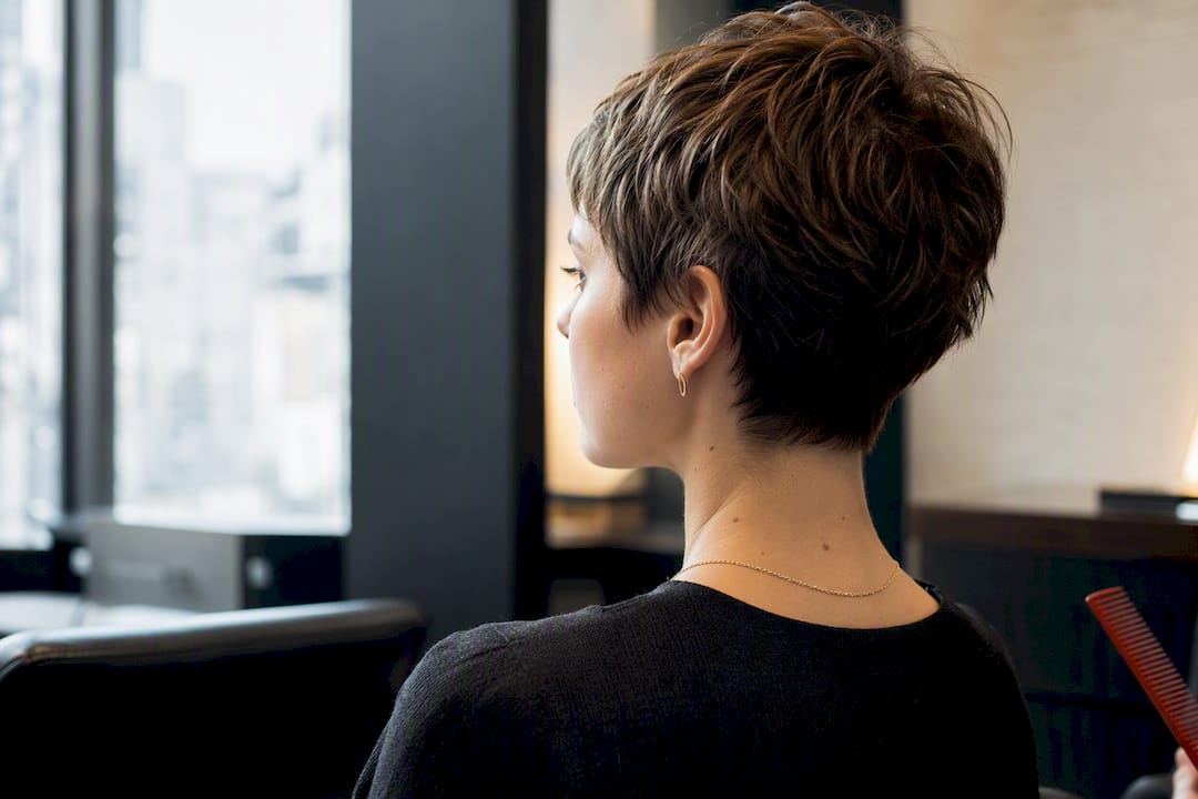 Grown-out pixie haircut in modern salon