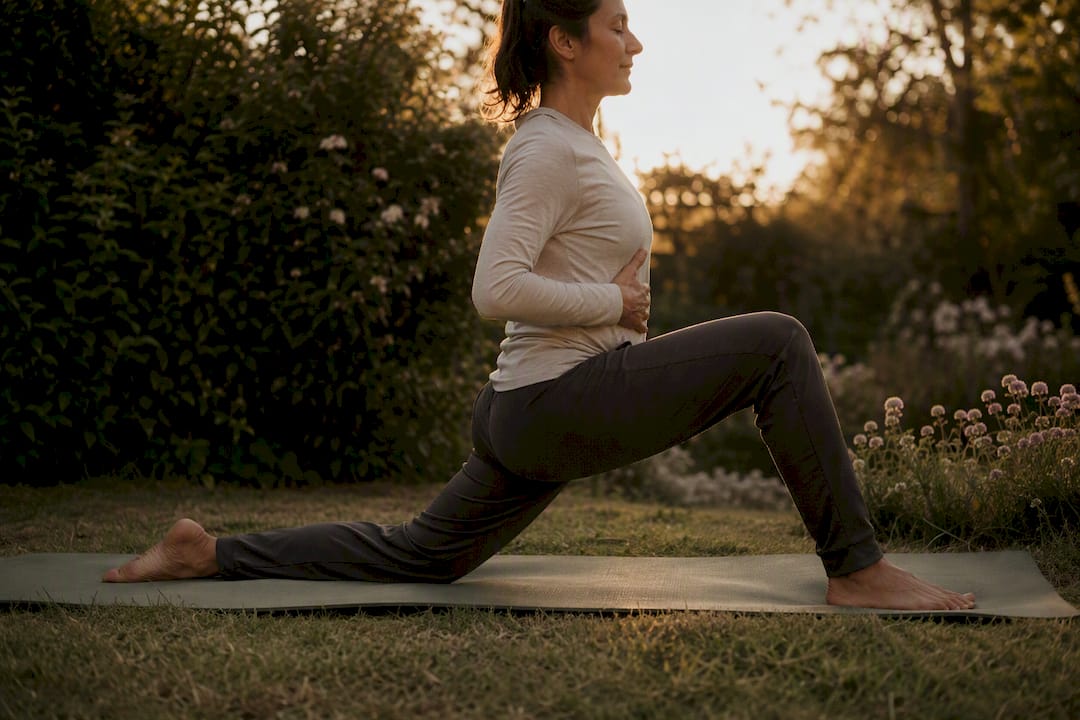 Person doing psoas stretch with deep breathing