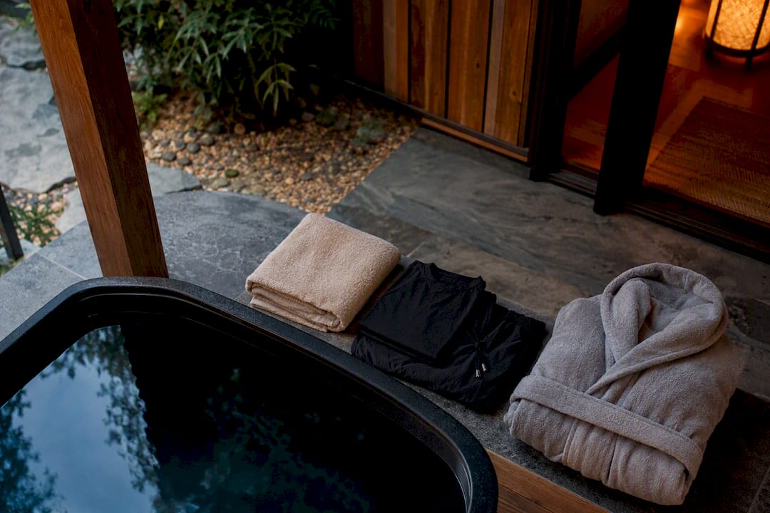 Towel and dry clothes prepared beside plunge
