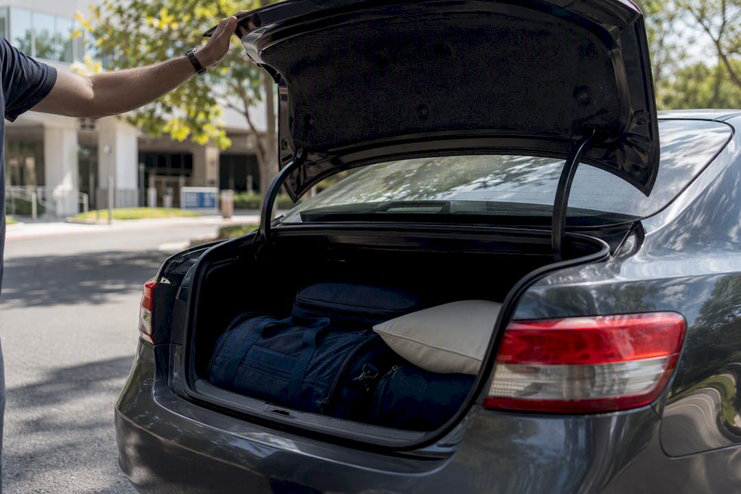 Person reaching for car keys before medical trip