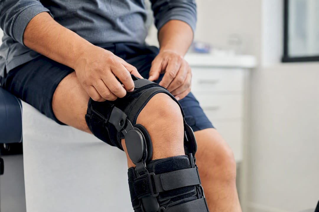 Orthopedic knee brace close-up on leg