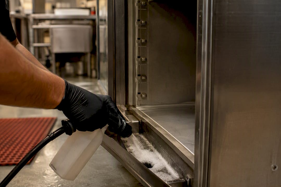Sanitizing commercial fridge drain pan
