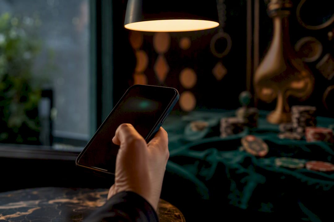 Hand holding phone receiving onboarding message
