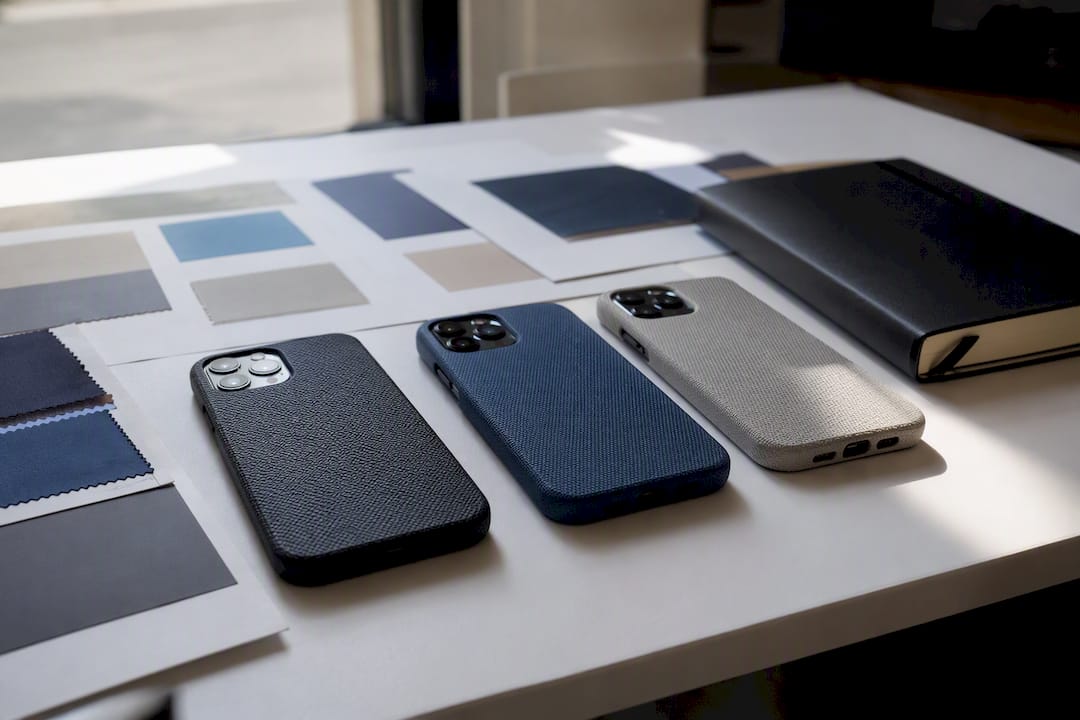 Creative ad asset mockups on designer table
