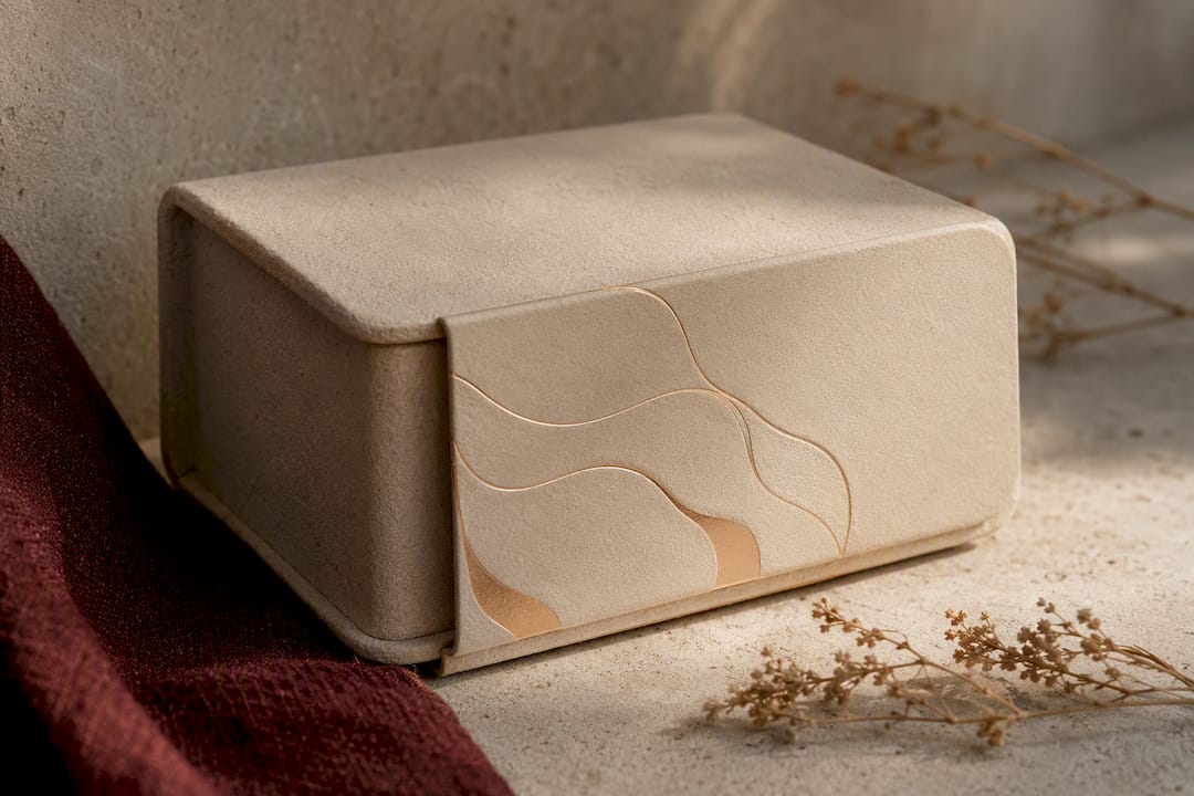 Eco-luxury molded pulp perfume box with metallic foil