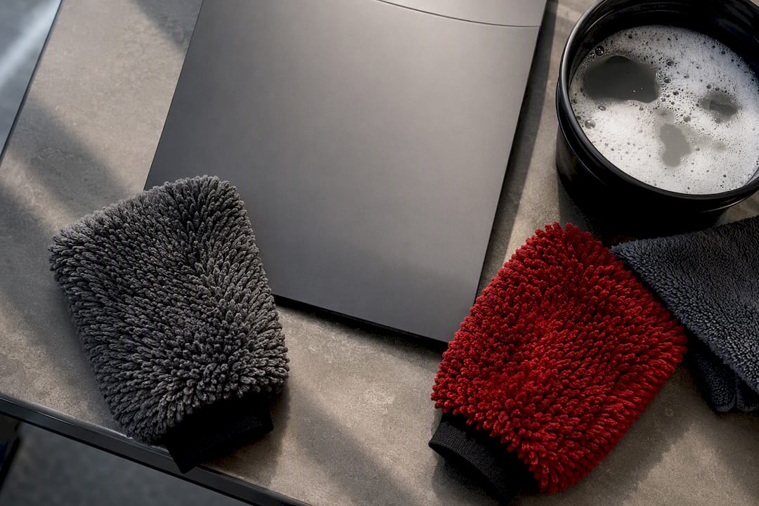 Separate wash mitts beside matte PPF