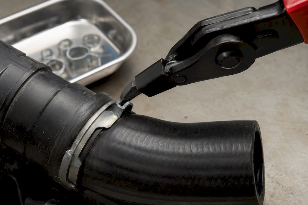 Swivel plier tip aligned with clamp ear