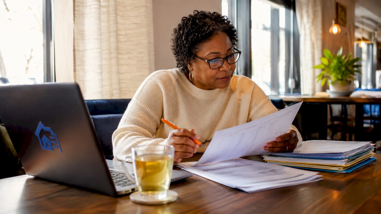 Landlord reviewing tenant screening documents