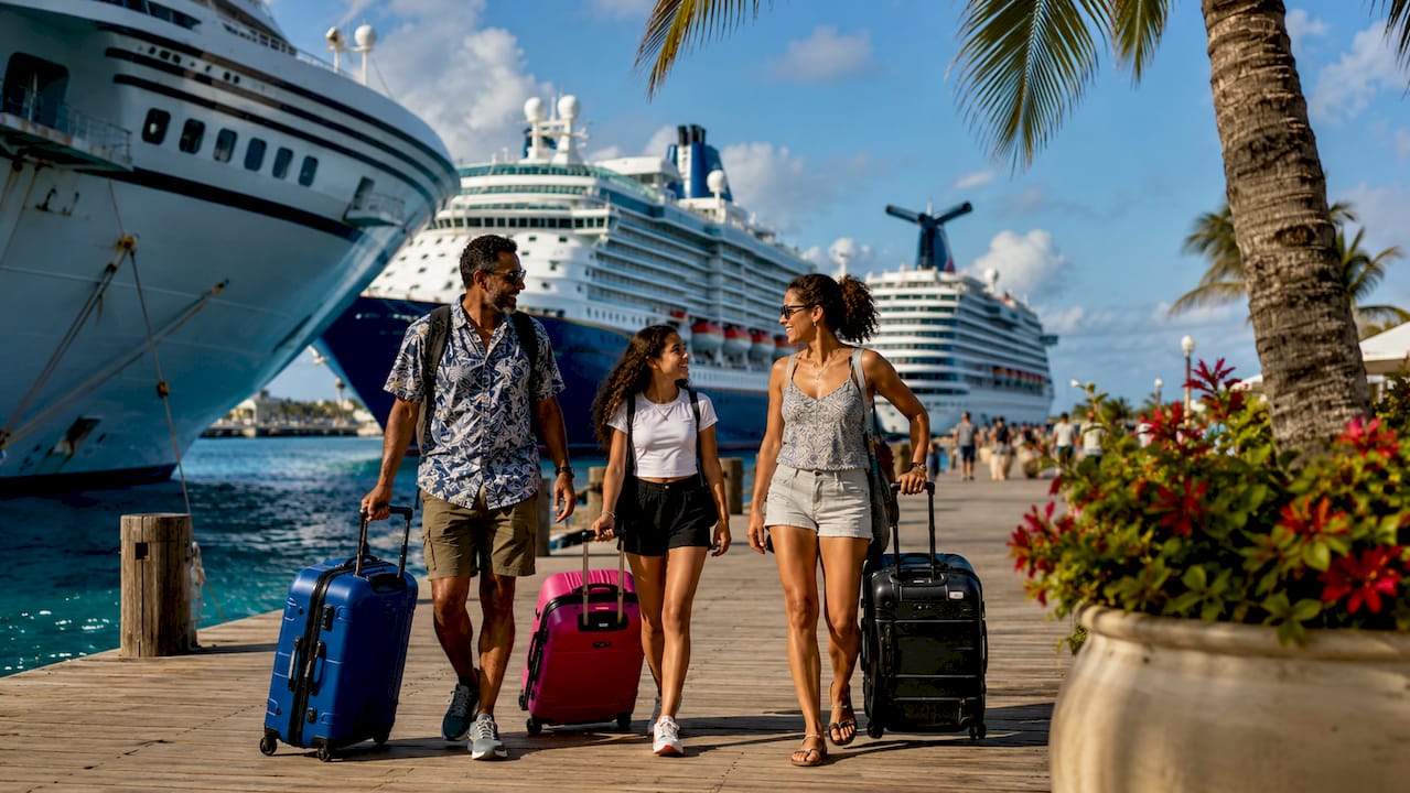 Various cruise ships docked at harbor with passengers