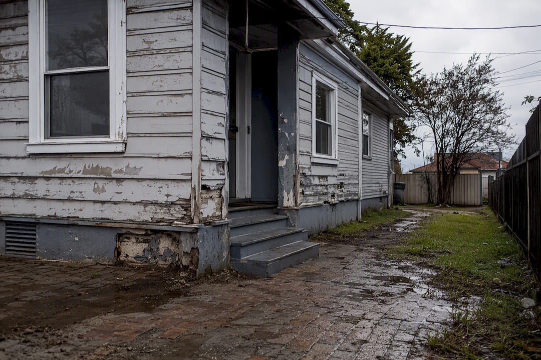 Flood-damaged rental property exterior