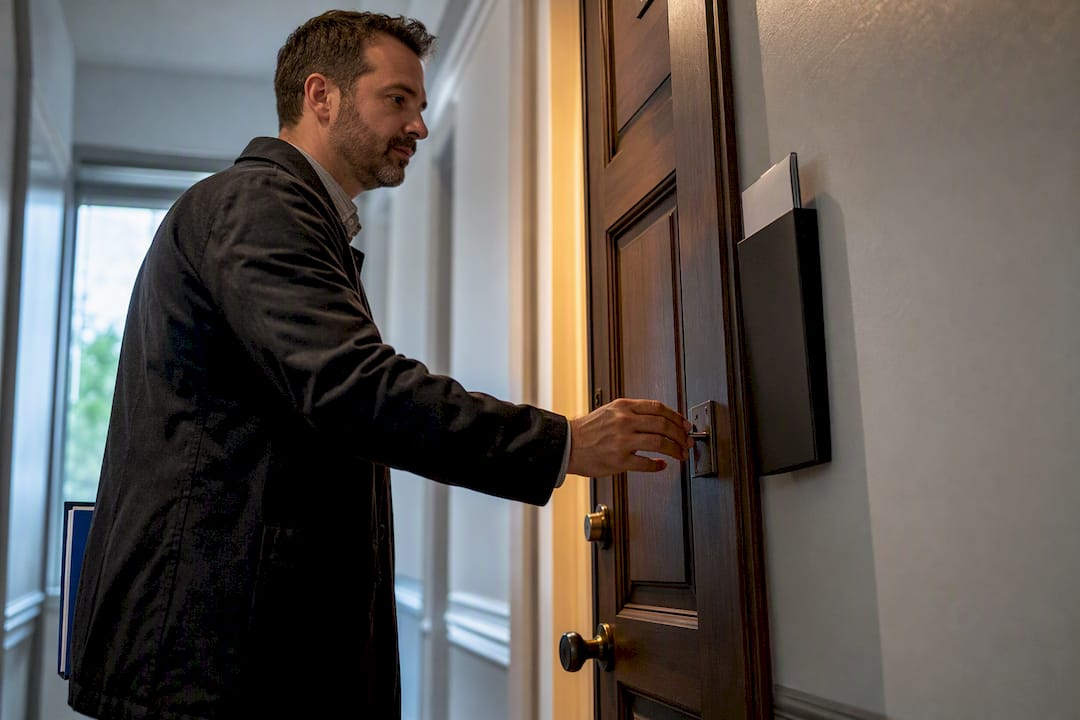 Rental entry door with notice holder