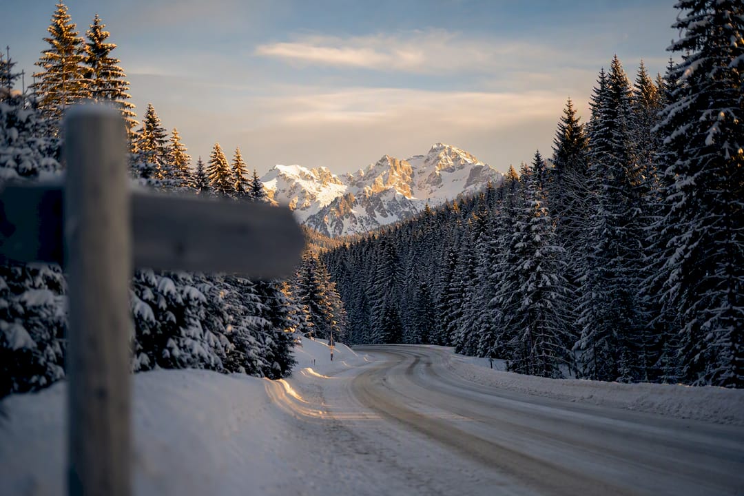 Snow-covered mountain road near Grenoble Airport